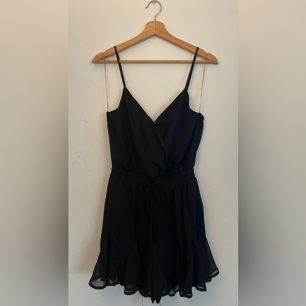 Francesca’s Black Ruffled Romper